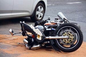 Motorcycle Collision Leads to Injuries at Day St & Piaget Ave